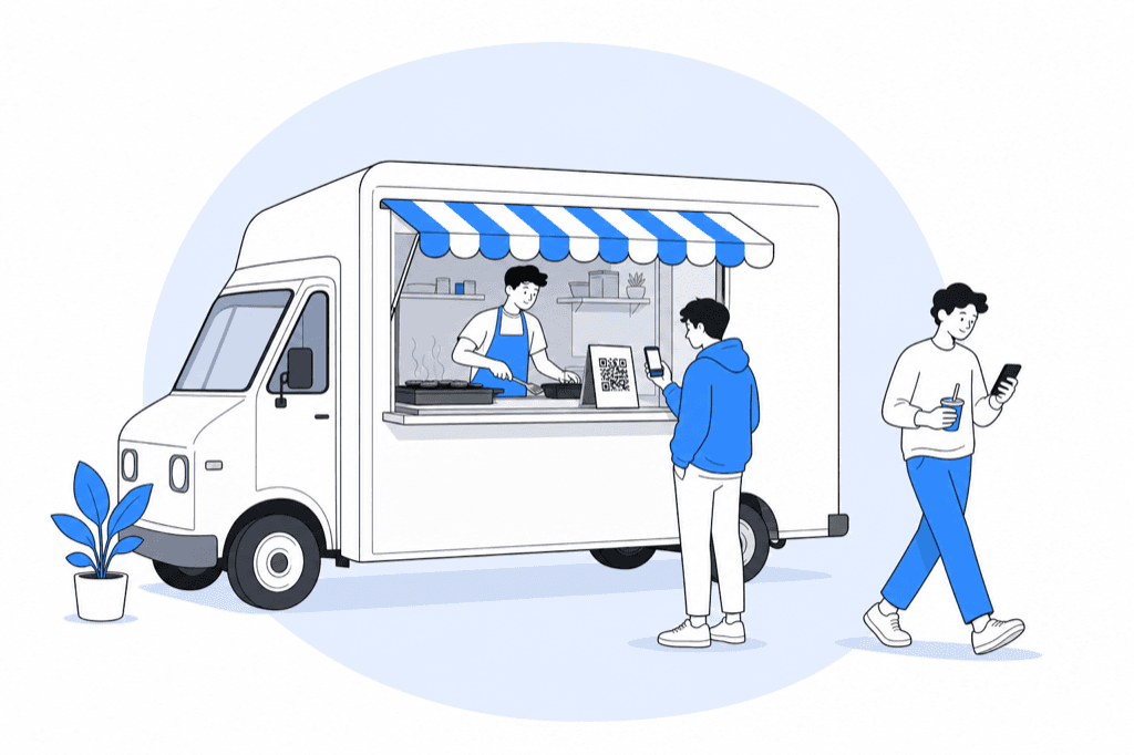 Customer scanning a QR code stand on a food truck window ledge while the cook works the grill